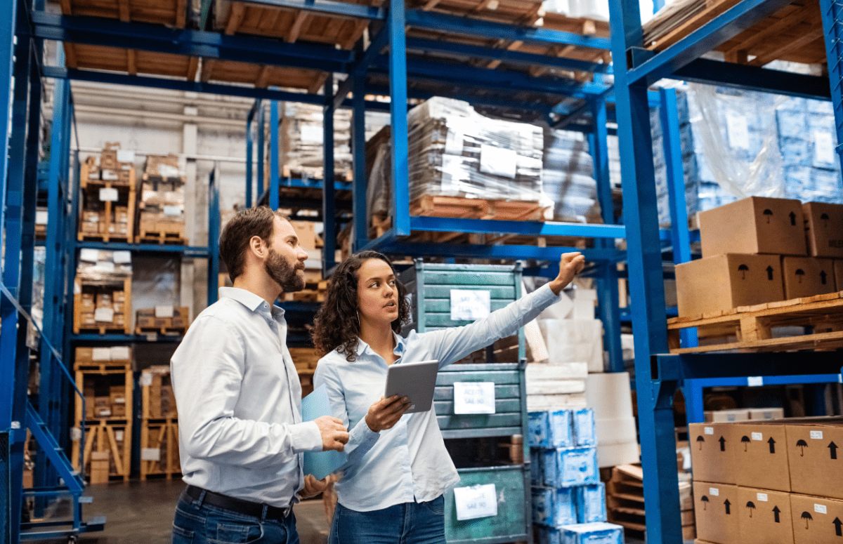 man and woman in warehouse